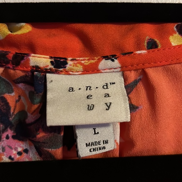 a new day sleeveless button down blouse
Size: Large
Color: Orange/Red - Picture 9 of 16